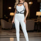 Black buckled shoulder chest harness by HarnessClub, vegan leather over white bodysuit