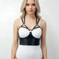 Black caged strap overbust corset bustier with vegan leather and white cup panels