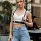 HarnessClub black vegan leather shoulder-strap waist harness worn by model