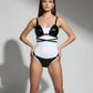 HarnessClub black studded vegan leather bralette and brief set on model with adjustable straps and visible studs
