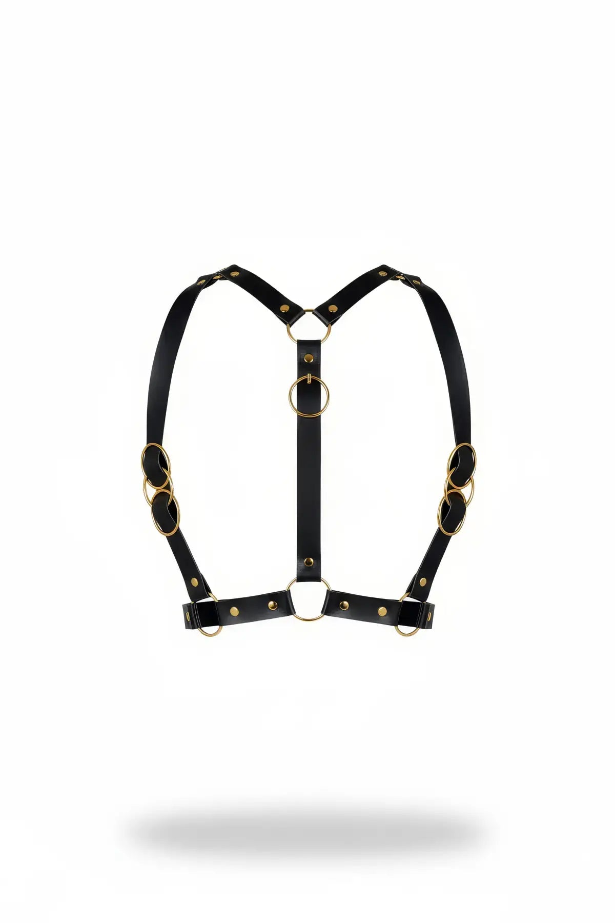 Black vegan-leather Y-frame chest harness with gold O-ring accents by HarnessClub