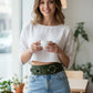 Olive wide O-ring festival waist belt by HarnessClub in vegan leather with statement hardware