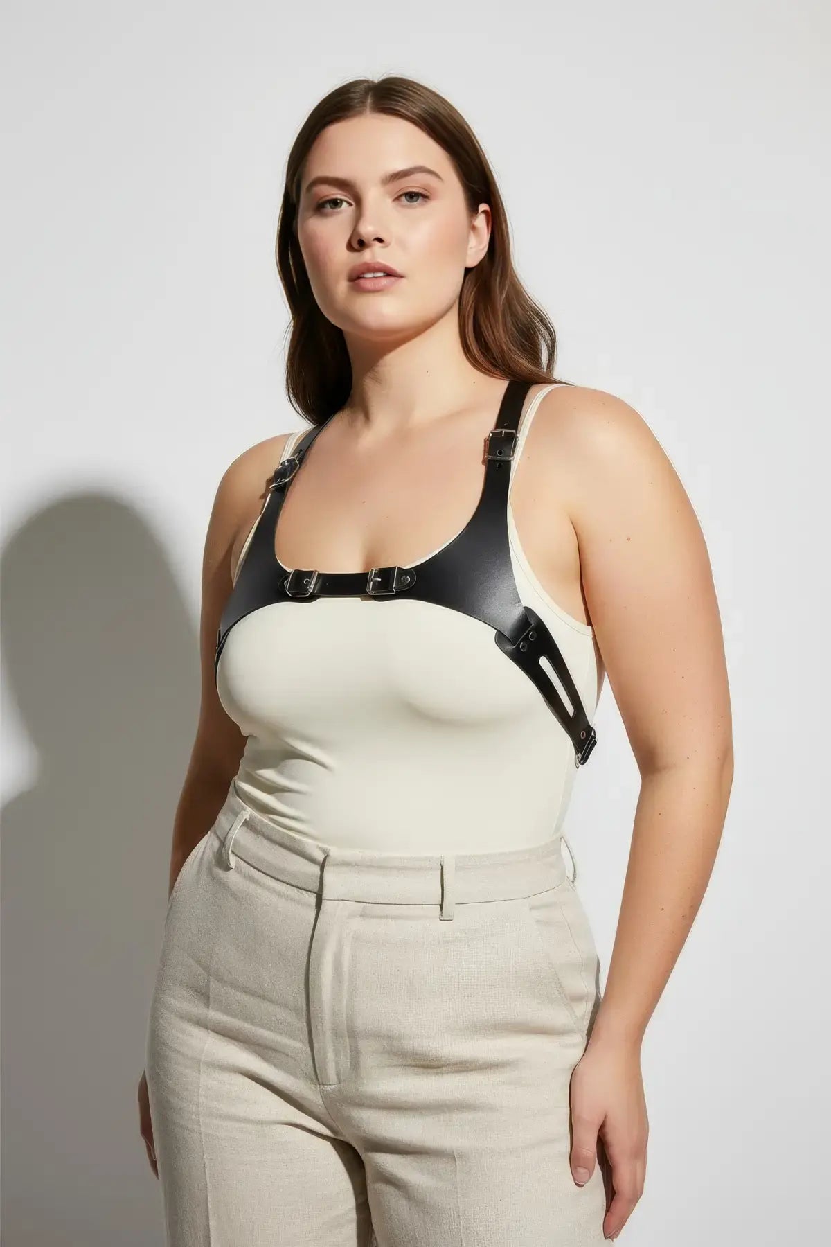 Plus Size Black Adjustable Leather Body Harness worn over a cream top
