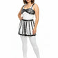Plus-size black belted caged bralette and skirt harness in vegan leather, model wears white base with black straps.