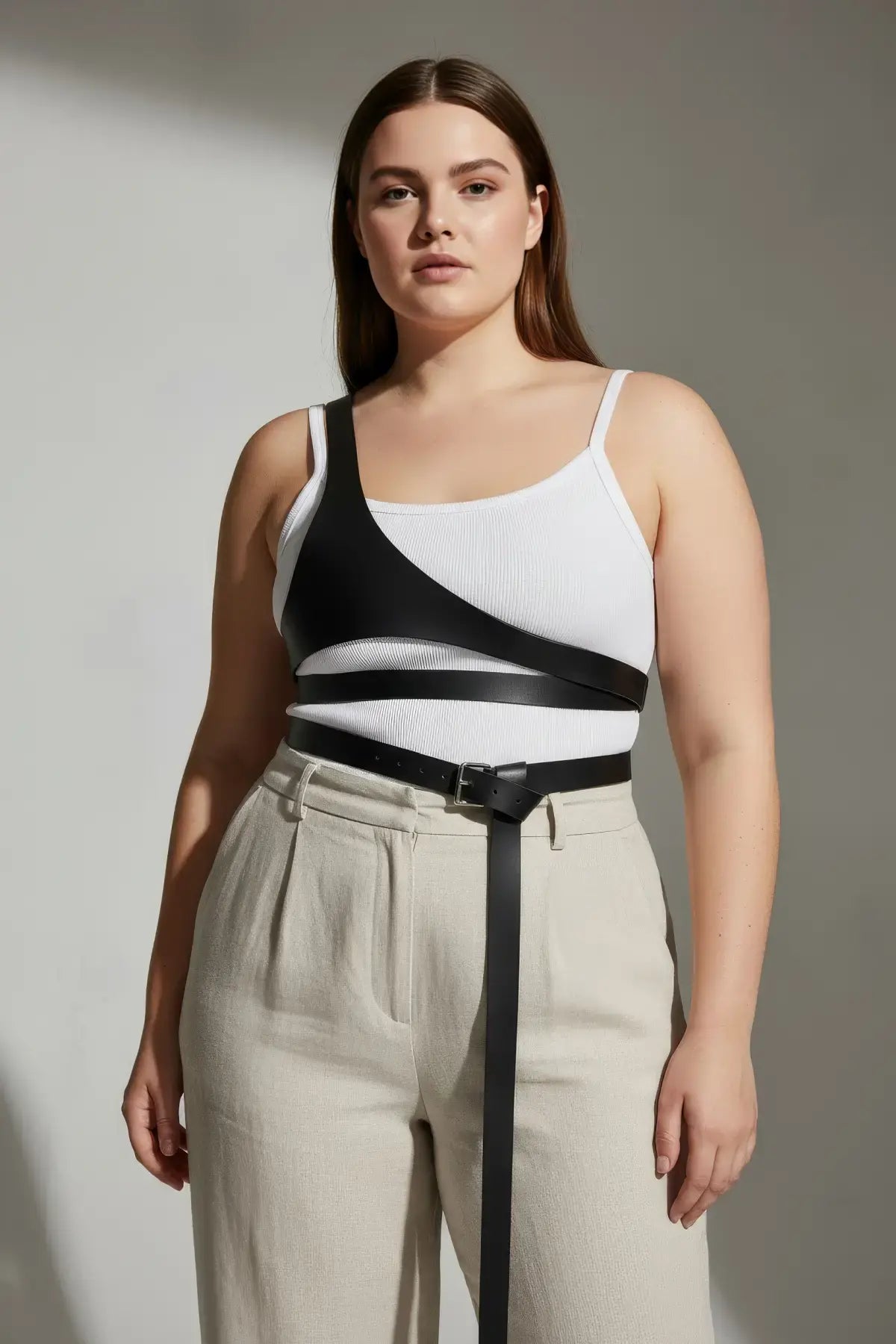 Plus Size Black Body Harness with minimalist vegan leather straps; adjustable, architectural.