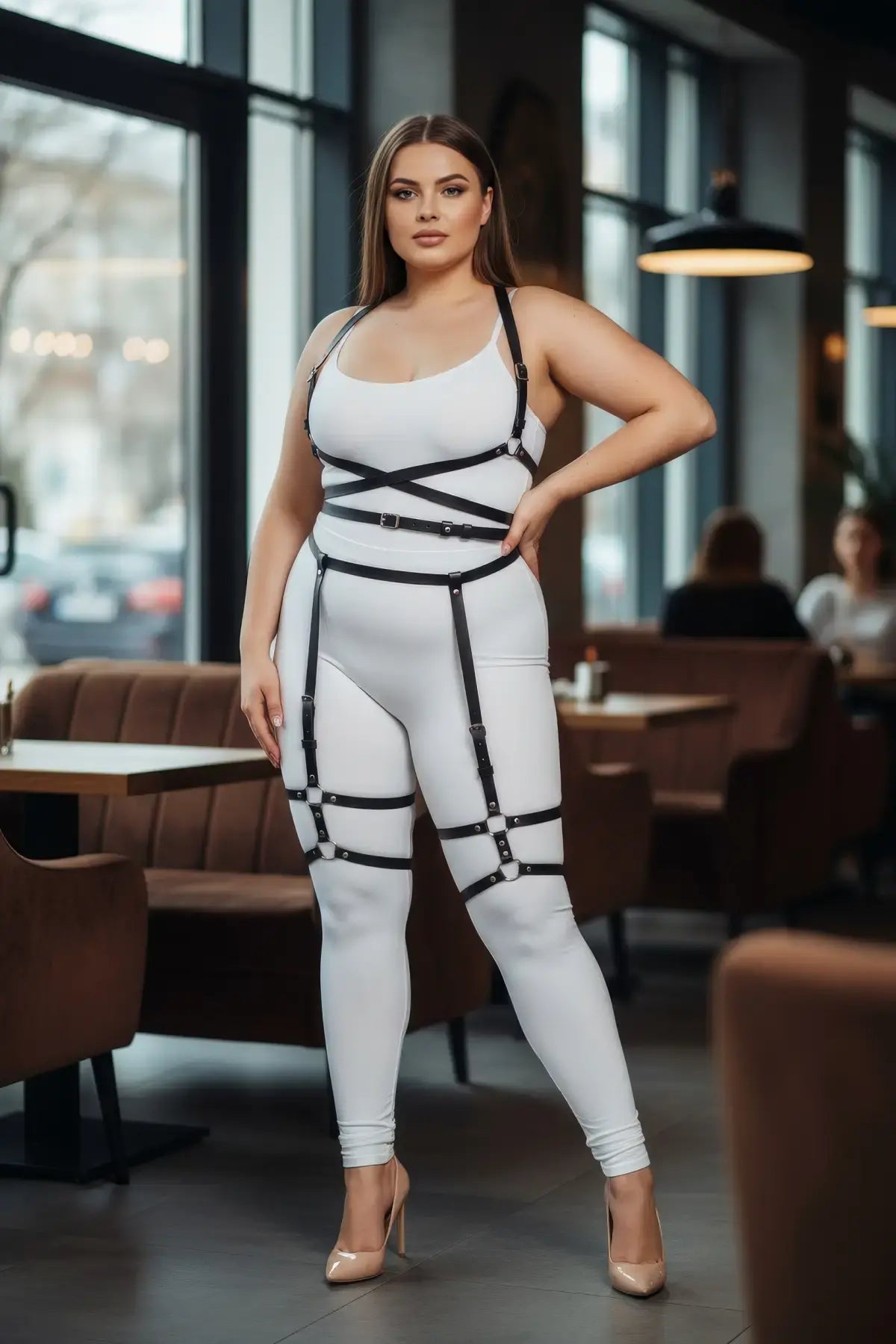 Plus-size garter harness set with black faux-leather straps over a white bodysuit, full silhouette.