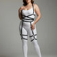 Plus-size black faux-leather garter harness set worn by model, full silhouette design.
