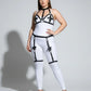 Plus size black faux-leather bustier-panel garter harness by HarnessClub, worn over a white bodysuit.