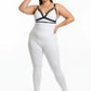 Plus-size black faux-leather bustier-style harness worn over a white bodysuit.