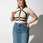Plus-size black cage chest harness with a turtleneck strap in vegan leather