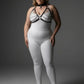 Plus-size black faux-leather chain-and-collar body harness on white bodysuit