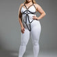 Plus Size Black Chain and O-Ring Faux Leather Body Harness on model with white bodysuit and silver chains.