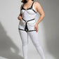 Plus-size black faux-leather body harness with O-ring and gold chains worn over white bodysuit