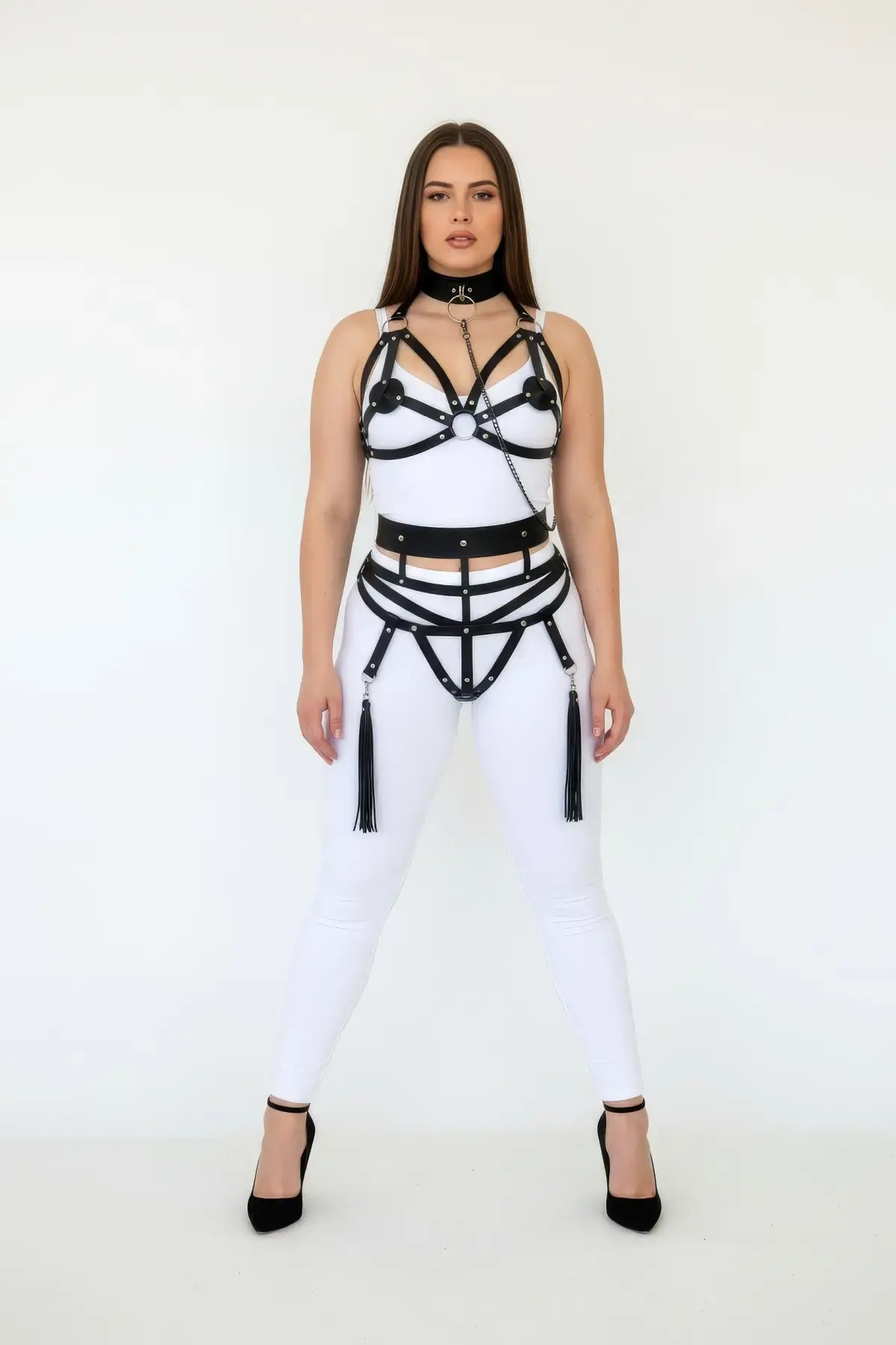 Plus-size black vegan leather body harness set with chain-back straps worn by model.