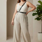 Plus-size black chain-detail body harness by HarnessClub, worn over a white tank top.