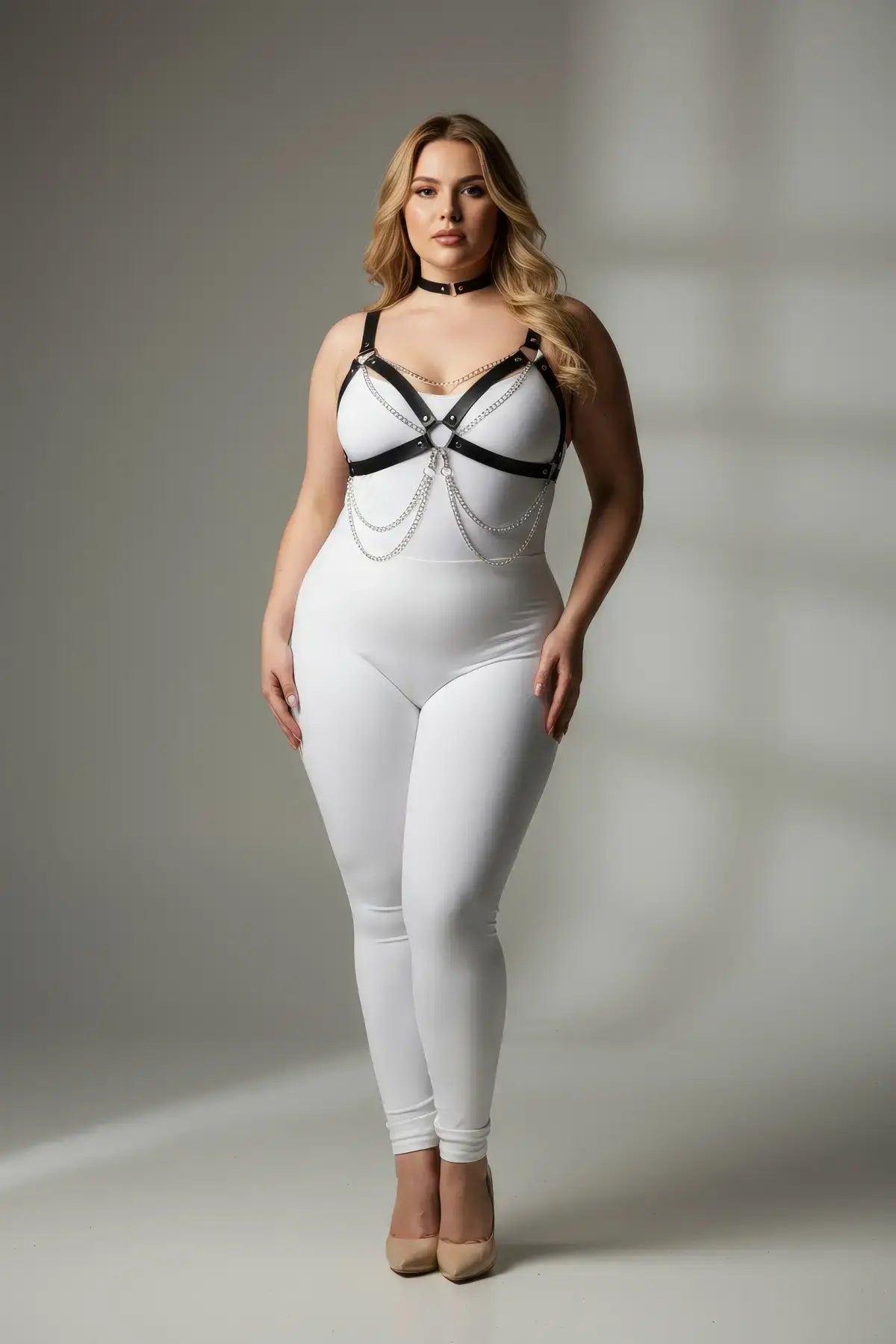 Plus-size black faux-leather body harness with chain details by HarnessClub