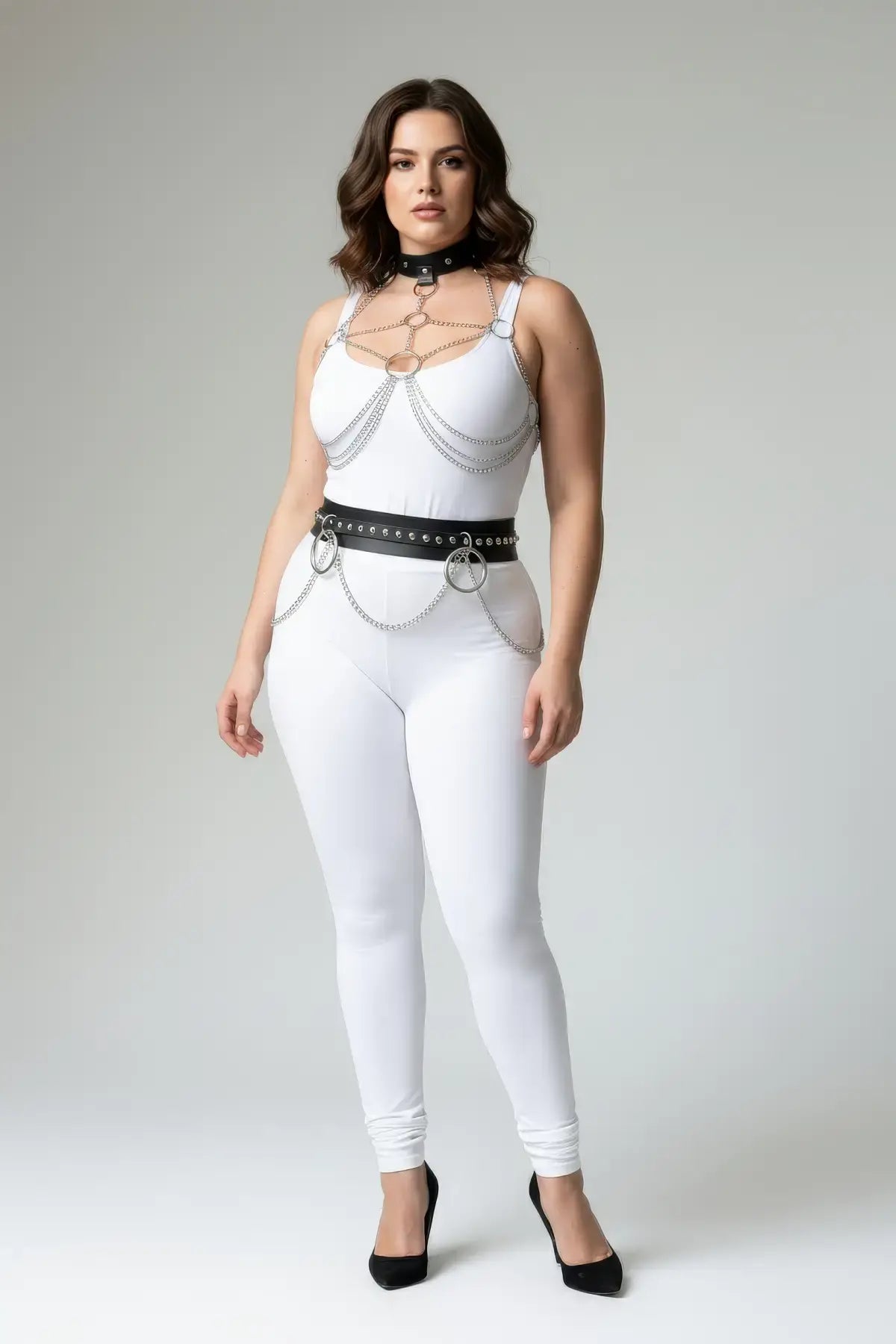 Plus-size black chain-drape collar and belt harness; vegan leather set with silver chains worn by model.