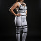 Plus-size black chain-drop full-body harness set by HarnessClub; vegan leather straps with hanging chains over bodysuit