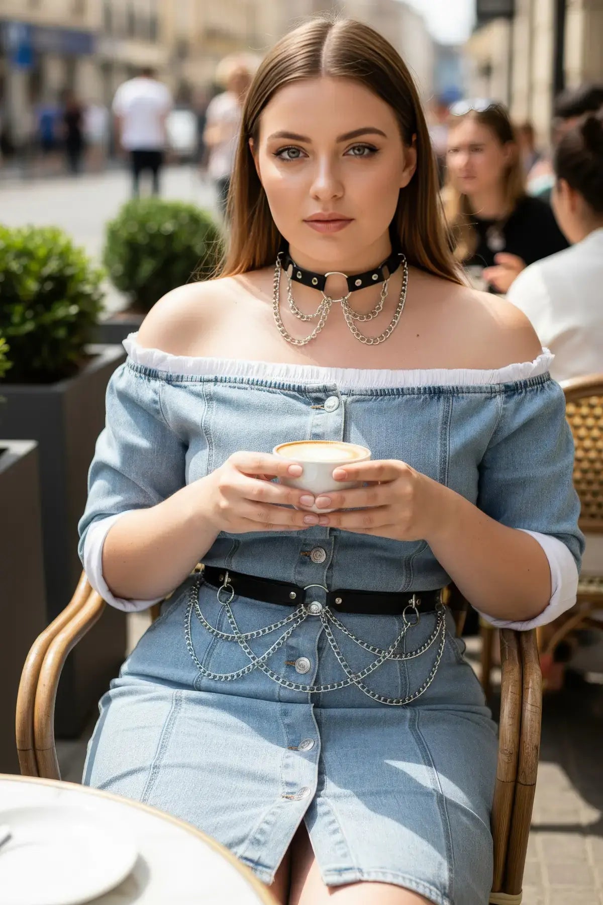 Plus-size black vegan-leather choker and chain hip belt two-piece set with silver chains on an off-shoulder denim dress