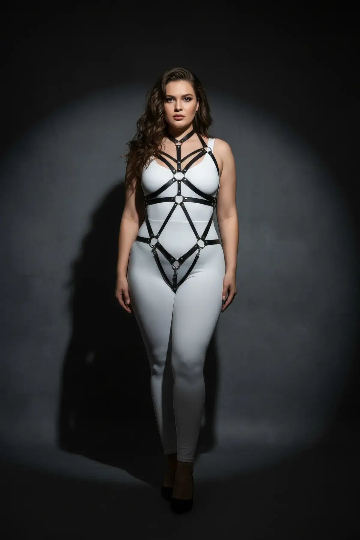 Plus size black choker cage full-body harness in vegan leather worn over white bodysuit
