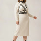 Plus Size Black Choker Full Body Harness by HarnessClub with vegan leather straps over cream knit dress