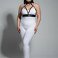 Plus-size black collar-detail faux leather harness set worn over a white bodysuit, body accessory.