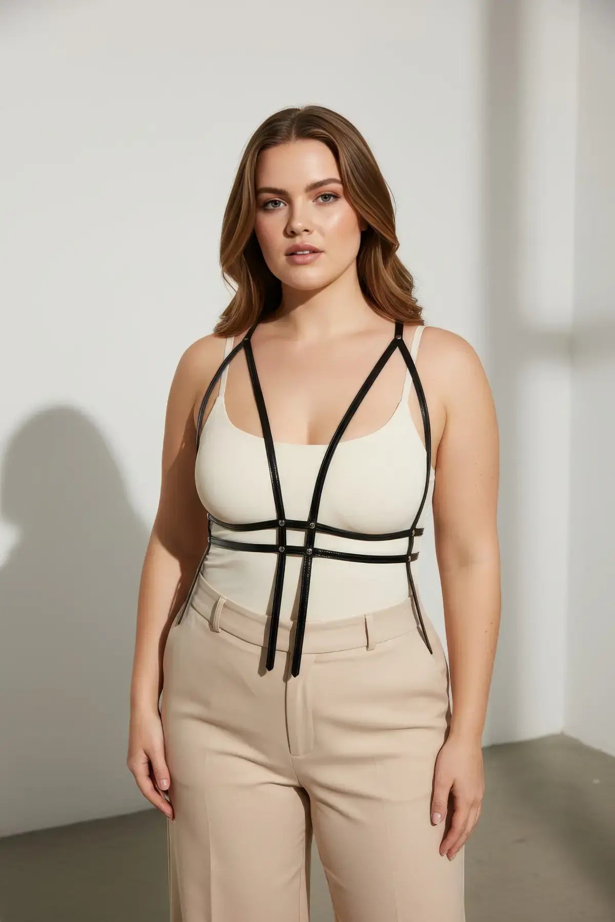 Plus Size Black Corset Body Harness worn over a beige top