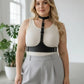 Plus-size black leather corset-style harness on model featuring neck collar and waist belt.