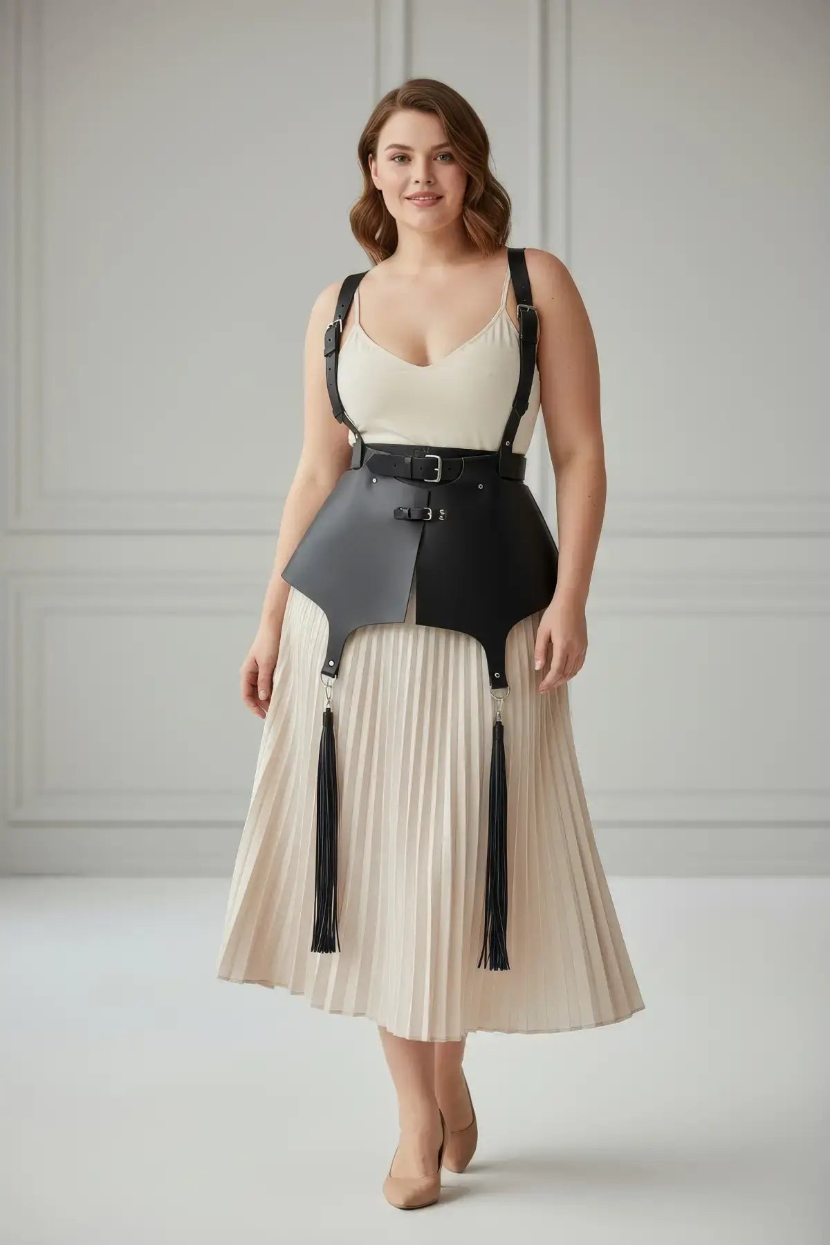 Plus-size black vegan-leather corset suspender harness with tassels.