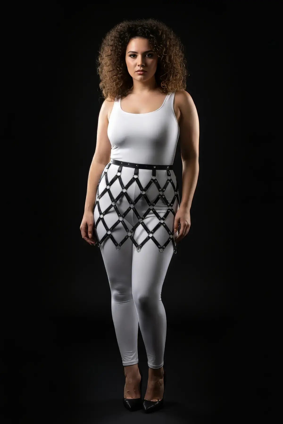 Plus Size Black Diamond Mesh Cage Harness Skirt by HarnessClub, vegan leather harness over white leggings