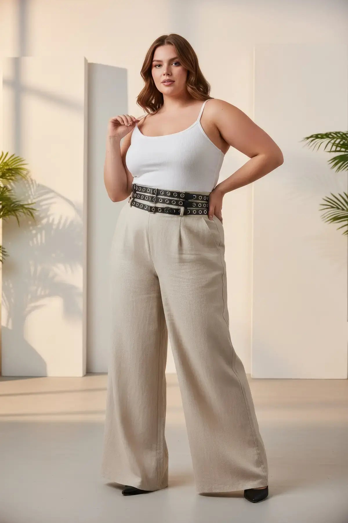 Plus Size Black double-row grommet wide belt with multi-buckle, vegan leather, worn at waist by HarnessClub