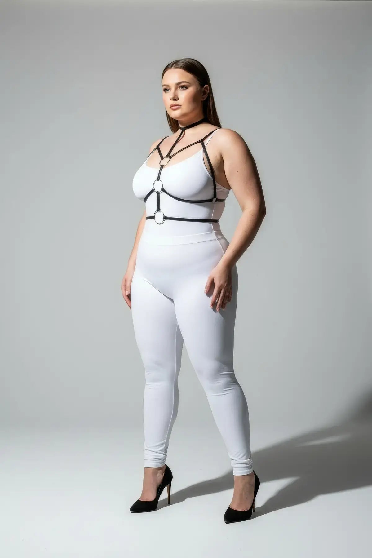 Plus Size Black Elastic Collar and O-Ring Harness by HarnessClub worn neck-to-waist on model