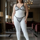 Plus Size Black Elastic Multi-Strap Fantasy Harness by HarnessClub worn over a white bodysuit.