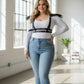 Plus Size Black Epaulette Fringe Shoulder Harness in vegan leather worn by model in a bright studio