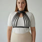Plus-size black fan-strap O-ring cage harness by HarnessClub, vegan leather body accessory.