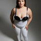 Plus-size black faux-leather bustier body harness worn by a model