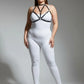 Plus Size Black Faux Leather Chest Harness by HarnessClub worn over a white bodysuit