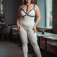 Plus Size Black Faux Leather Chest Harness by HarnessClub worn over a white bodysuit
