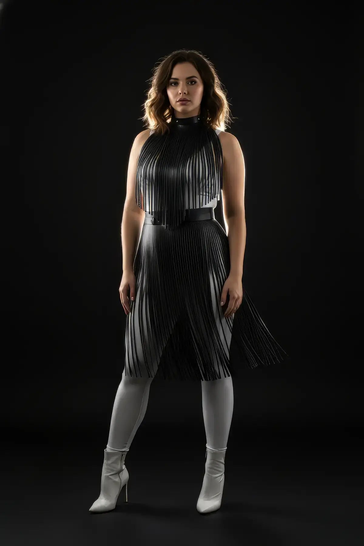 Plus-size black vegan leather fringe capelet and belted long skirt set by HarnessClub