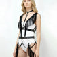 Plus-size black fringe-wing bralette and studded garter body harness set by HarnessClub, vegan leather.
