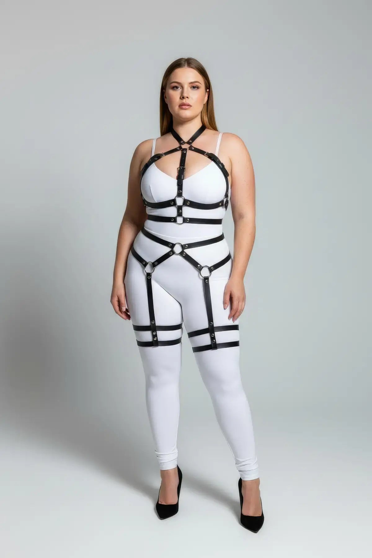 Plus-size black full-body garter harness with vegan leather straps and metal hardware