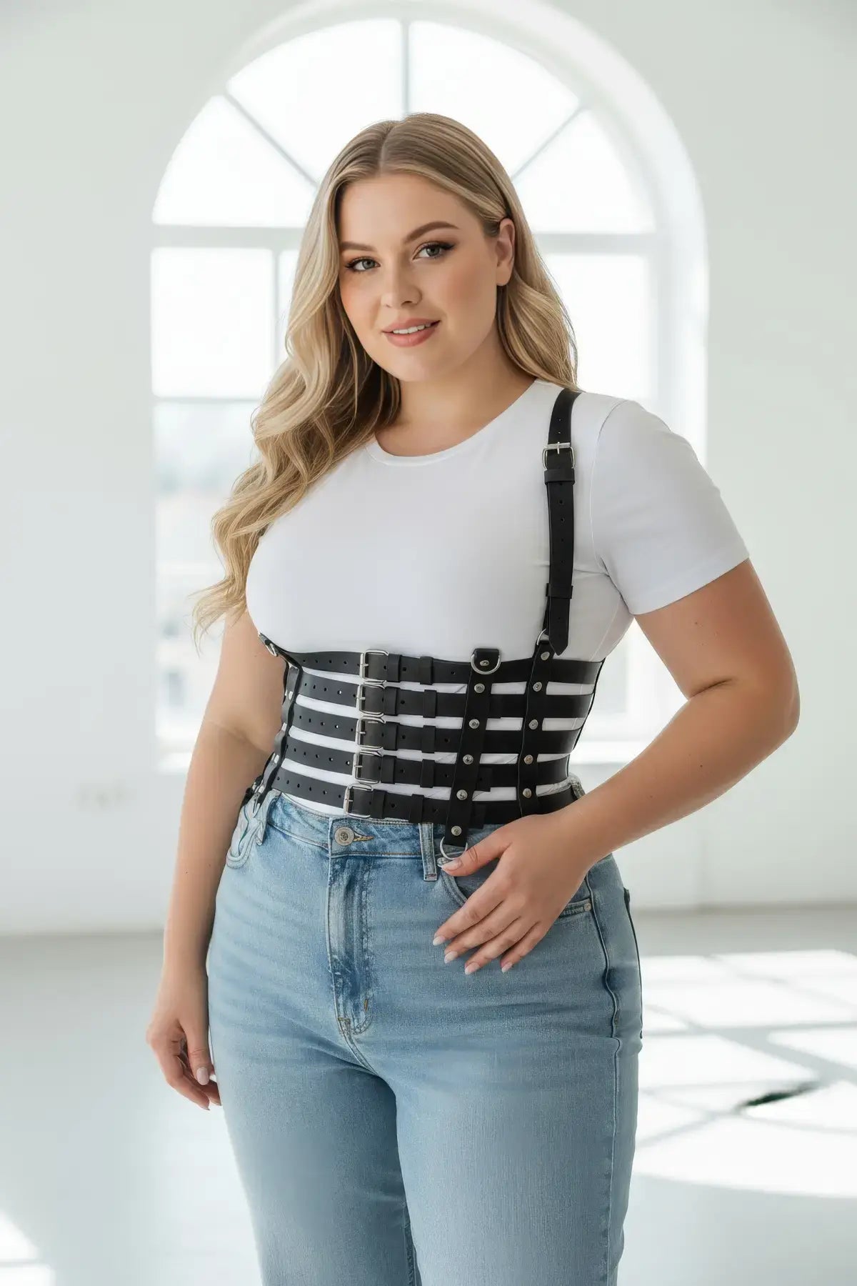 Plus-size black vegan leather full-torso corset body harness with multiple buckle straps.