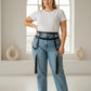 Plus-size black garter hip belt with dual leg straps and tassels, vegan leather by HarnessClub.