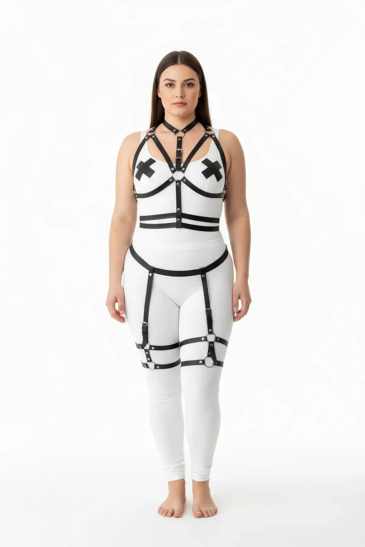 Plus-size black garter strap full-body harness set on model in white bodysuit; vegan leather straps, HarnessClub