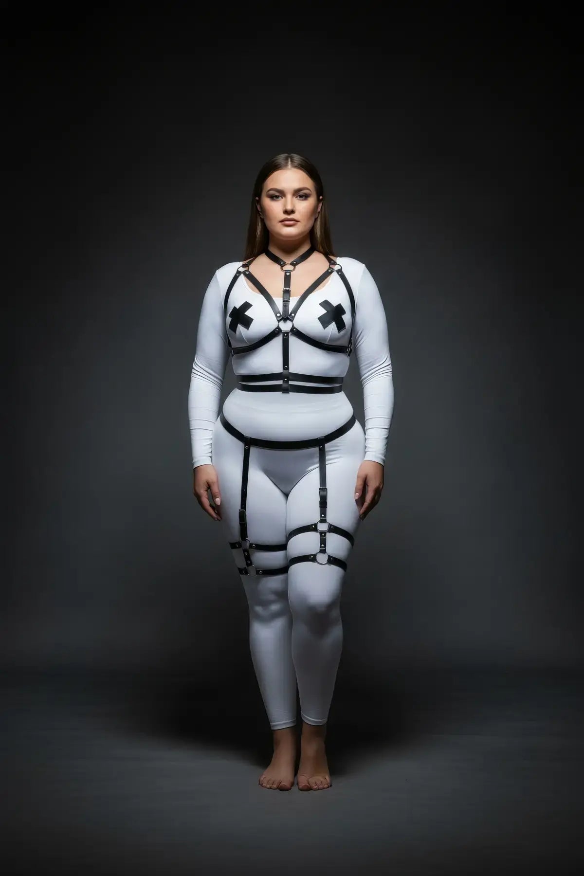 Plus-size black garter strap full-body harness set in vegan leather worn by model