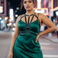 HarnessClub Plus Size Black Geometric Chest Harness worn over green satin dress; vegan leather body accessory.