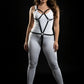 Plus-Size HarnessClub black geometric vegan leather full-torso body harness worn over a white bodysuit
