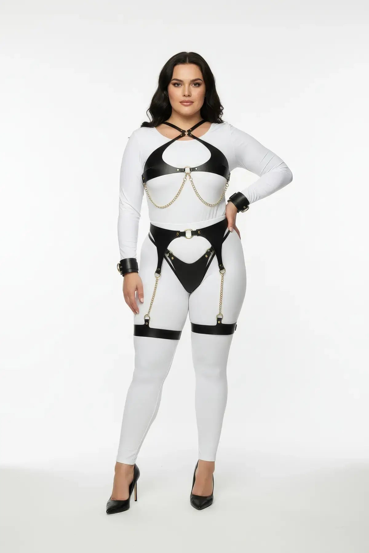 Plus-size black vegan-leather harness set with gold chains, garter belt and wrist cuffs, four-piece