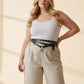 Plus-size black grommet belt with o-ring chain cluster; vegan leather statement belt.