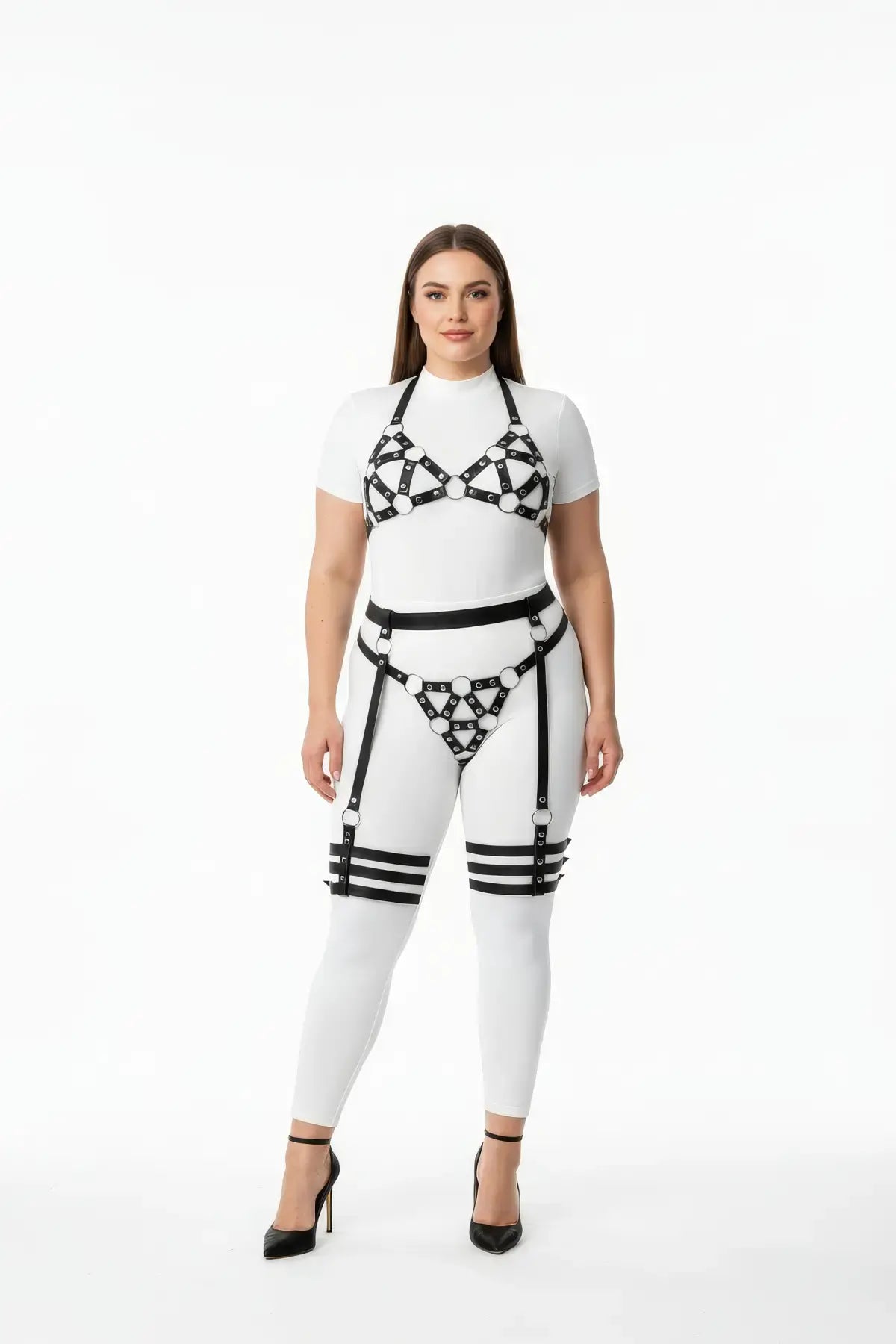 Plus-size black halterneck cage and multi-band thigh harness set in vegan leather.